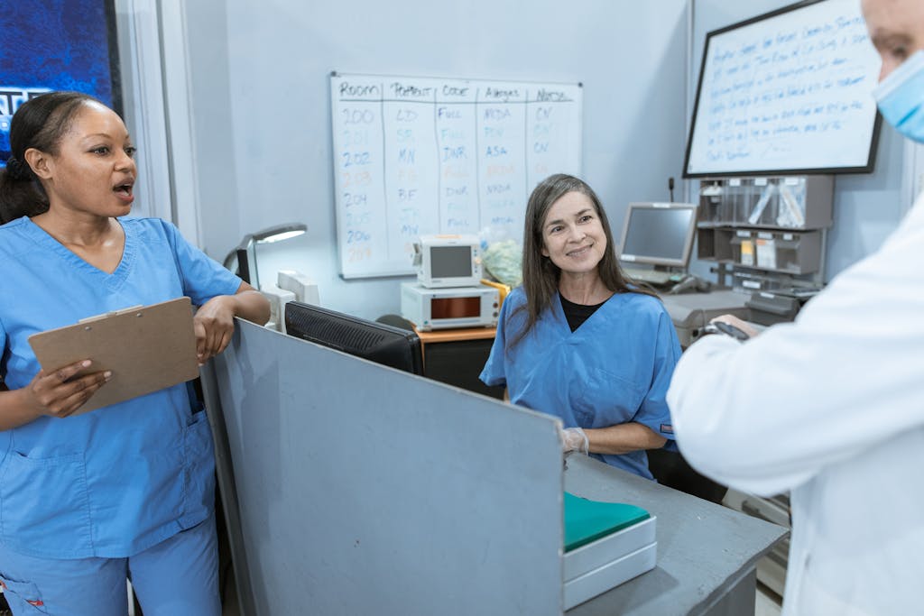 A Doctor and Nurses having Conversation